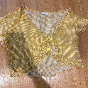 Yellow and white tie gingham top.